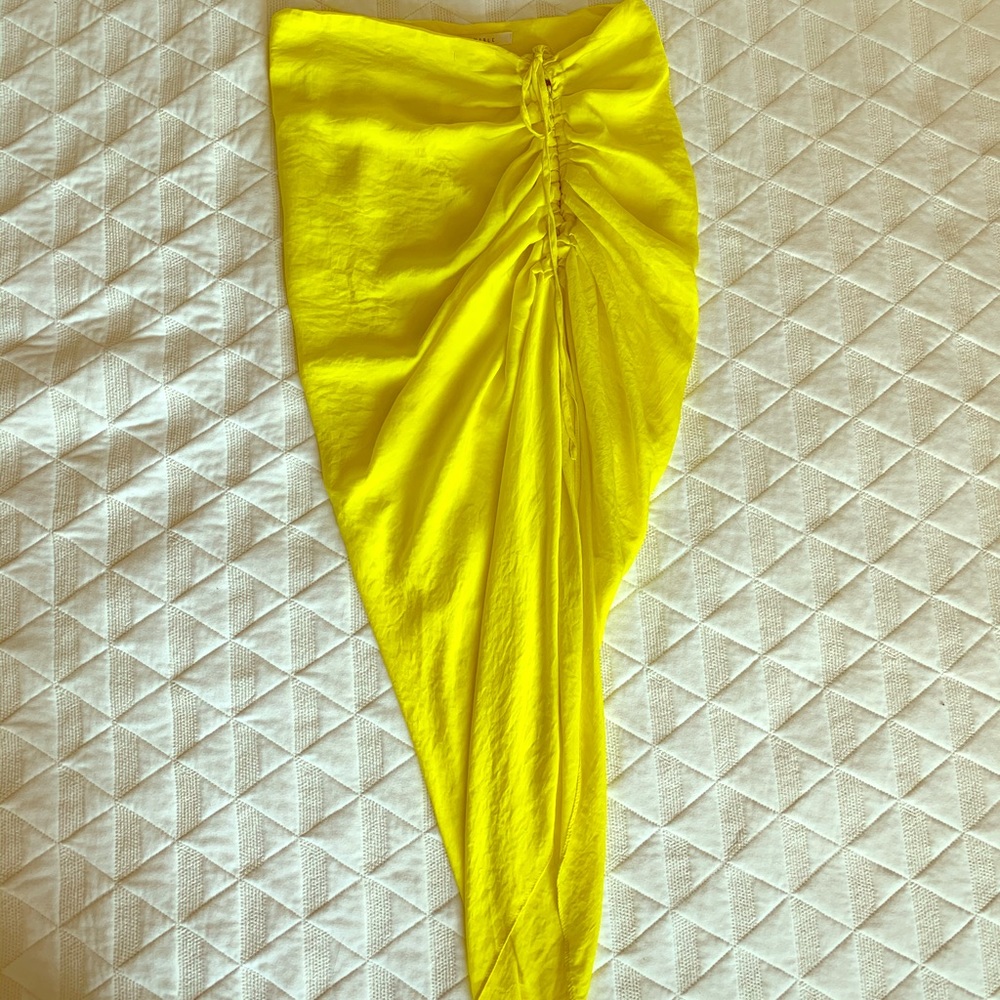 Bright yellow asymmetrical skirt